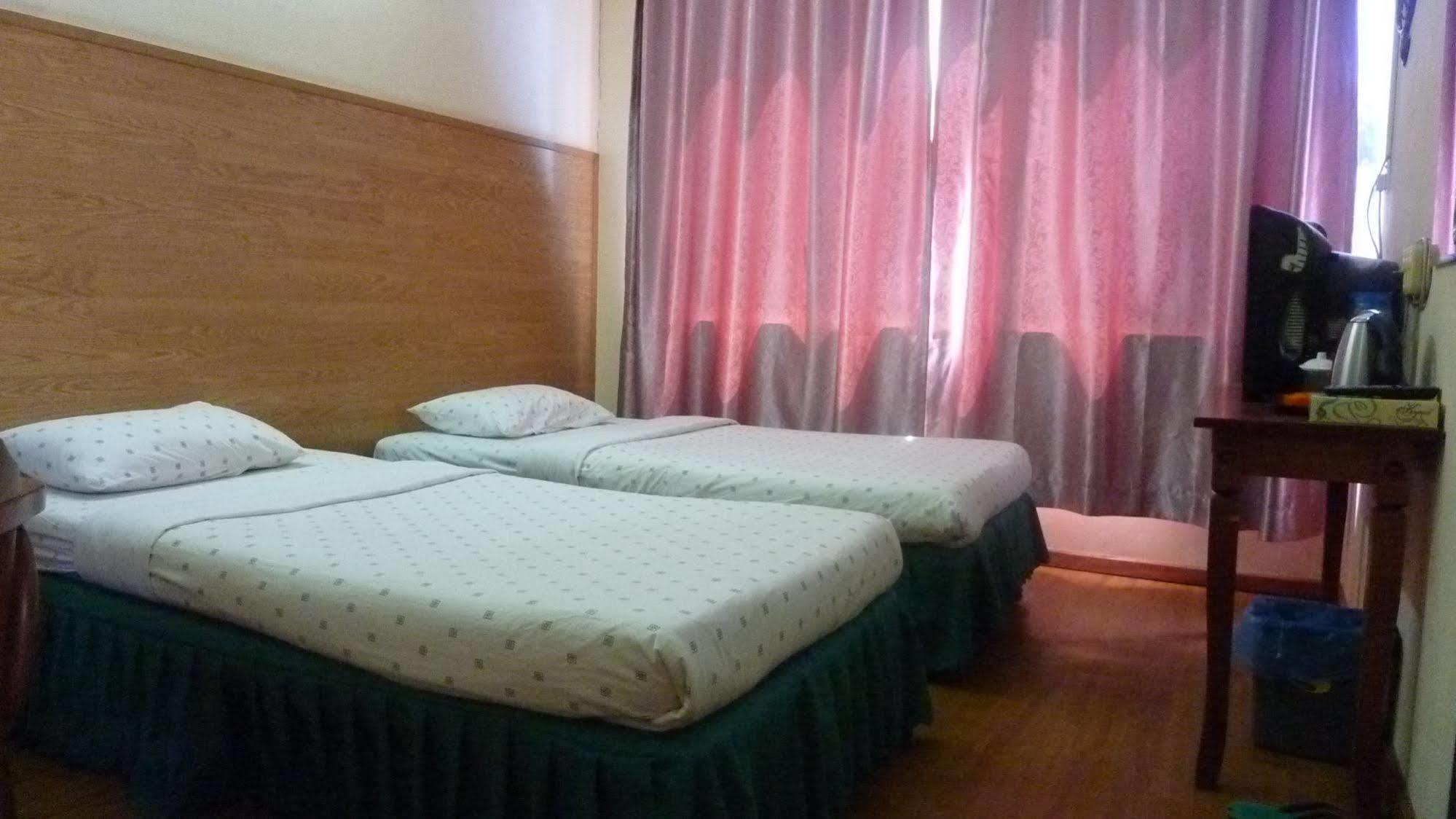 7 Hung Hung Inn Kota Kinabalu Exterior photo